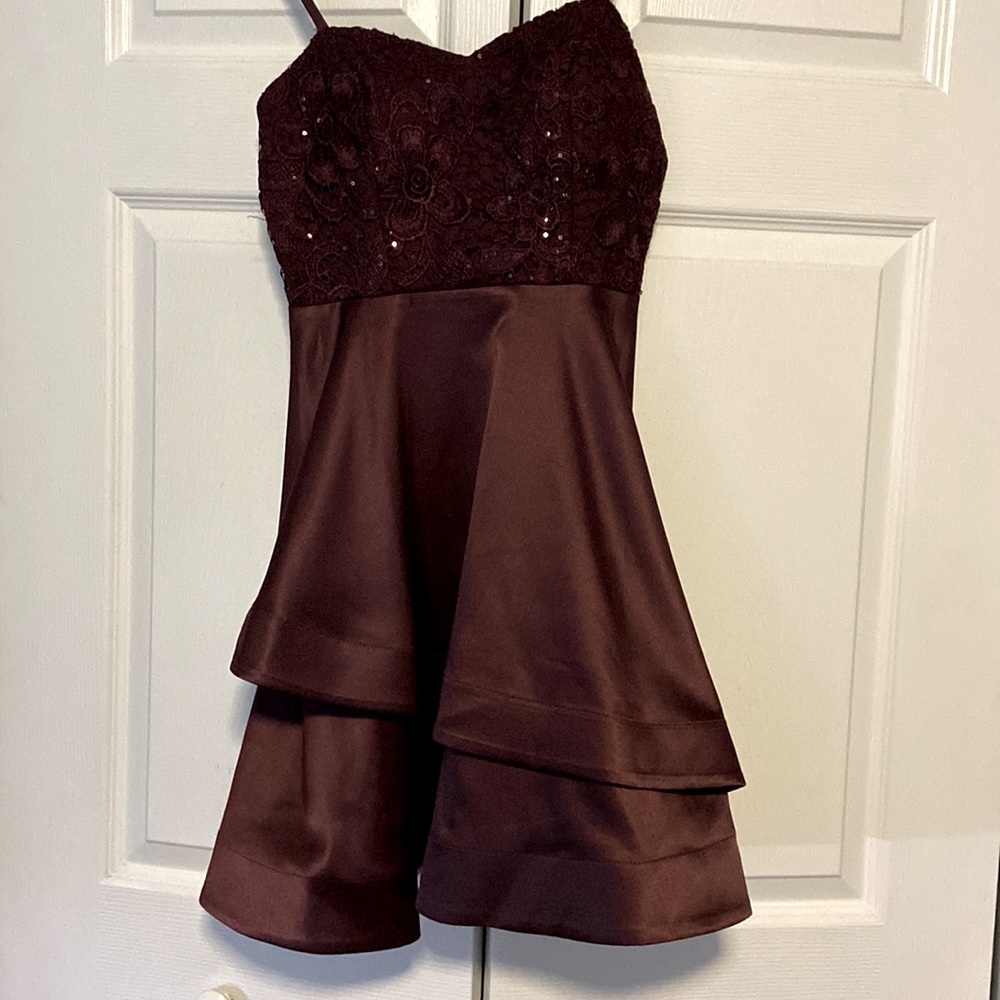 Purple lace top with think material bottom.